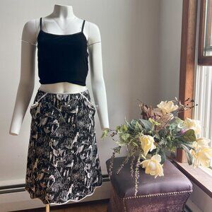 Vintage Mid Length Skirt in Black and White with artistic sketch pattern.